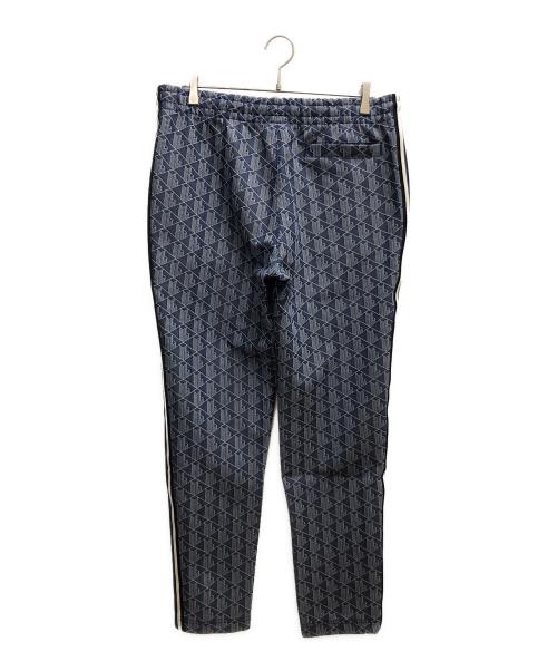 LACOSTE（ラコステ）LACOSTE (ラコステ) サイドテーピングモノグラムジャカードトラックパンツ ブルー×ホワイト サイズ:SIZE L(US)の古着・服飾アイテム