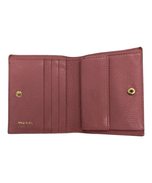 MIU MIU（ミュウミュウ）MIU MIU (ミュウミュウ) 2つ折り財布 ピンクの古着・服飾アイテム