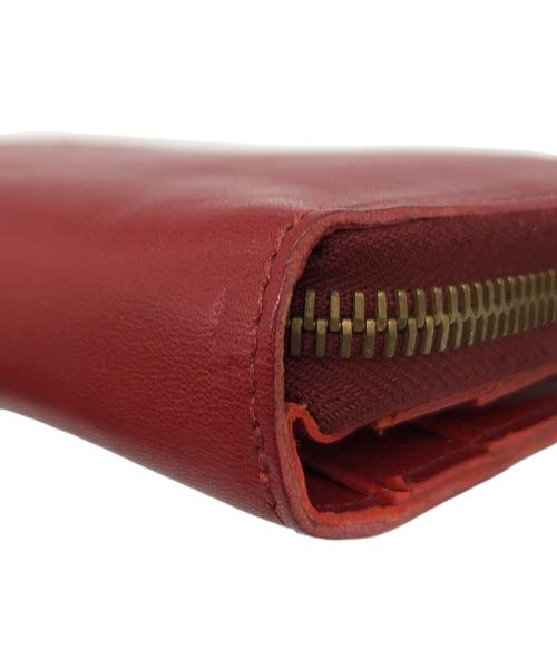 IL BISONTE（イル ビゾンテ）IL BISONTE (イル ビゾンテ) ラウンドファスナー長財布 レッドの古着・服飾アイテム