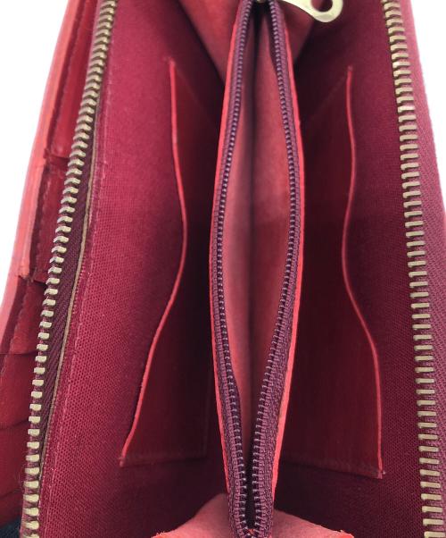 IL BISONTE（イル ビゾンテ）IL BISONTE (イル ビゾンテ) ラウンドファスナー長財布 レッドの古着・服飾アイテム