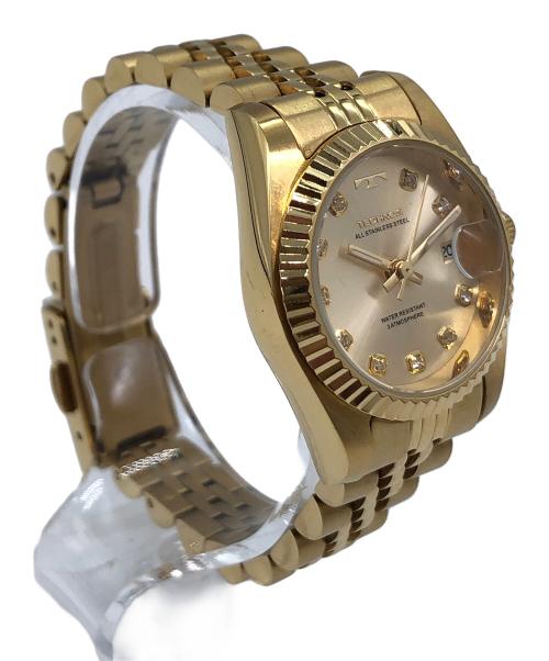 TECHNOS（テクノス）TECHNOS (テクノス) 腕時計 ゴールドカラーの古着・服飾アイテム