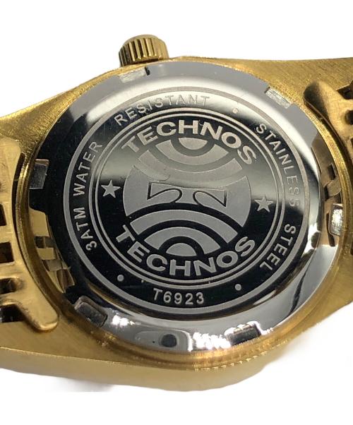 TECHNOS（テクノス）TECHNOS (テクノス) 腕時計 ゴールドカラーの古着・服飾アイテム