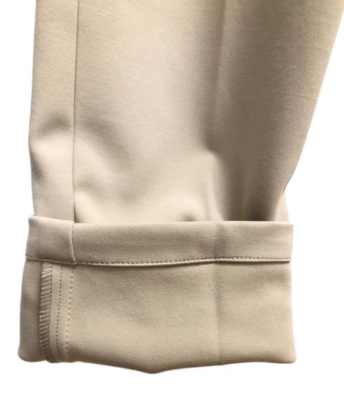 hummel（ヒュンメル）hummel (ヒュンメル) テーパードパンツ　スラックス ベージュ サイズ:SIZE Mの古着・服飾アイテム