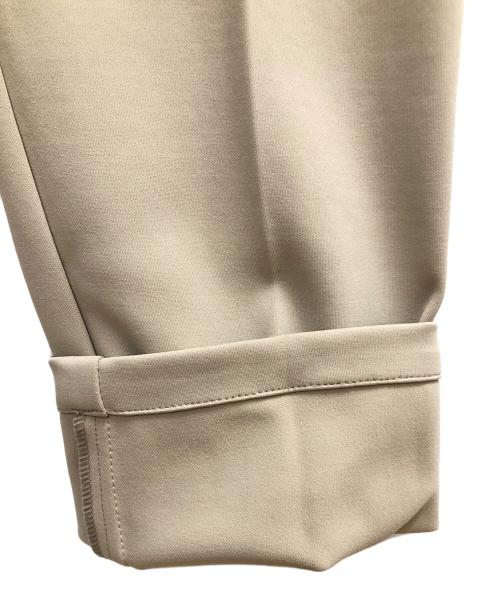 hummel（ヒュンメル）hummel (ヒュンメル) テーパードパンツ　スラックス ベージュ サイズ:SIZE Mの古着・服飾アイテム
