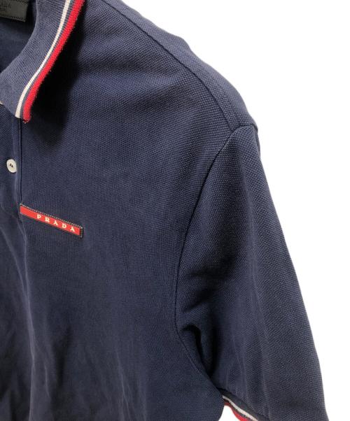 PRADA（プラダ）PRADA (プラダ) ポロシャツ ネイビー×レッド サイズ:SIZE Lの古着・服飾アイテム