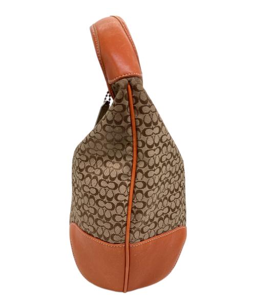 COACH（コーチ）COACH (コーチ) ミニシグネチャー　ハンドバッグ オレンジの古着・服飾アイテム
