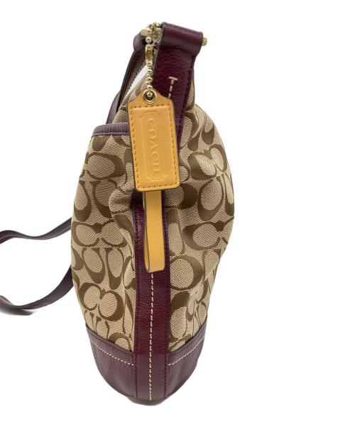 COACH（コーチ）COACH (コーチ) シグネチャー　ショルダーバッグ ベージュ×パープルの古着・服飾アイテム