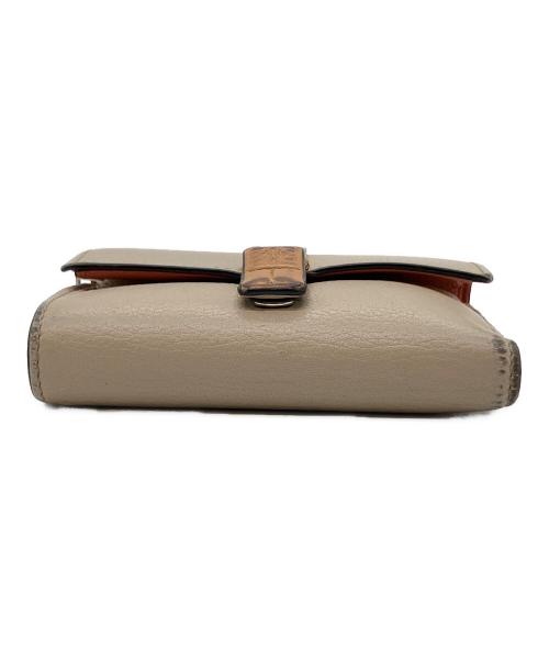 LOEWE（ロエベ）LOEWE (ロエベ) アナグラム　バーティカル ウォレット スモール ベージュ×ピンクの古着・服飾アイテム