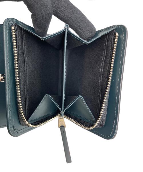 PAUL SMITH（ポールスミス）PAUL SMITH (ポールスミス) ブライトストライププラー　P915　2つ折り財布 ブラック 未使用品の古着・服飾アイテム