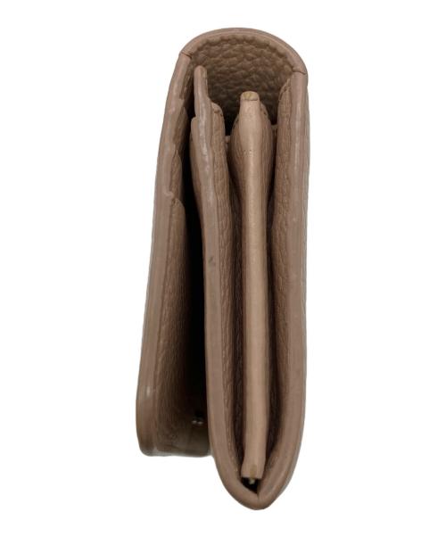 TOD'S（トッズ）TOD'S (トッズ) 長財布 ピンクの古着・服飾アイテム