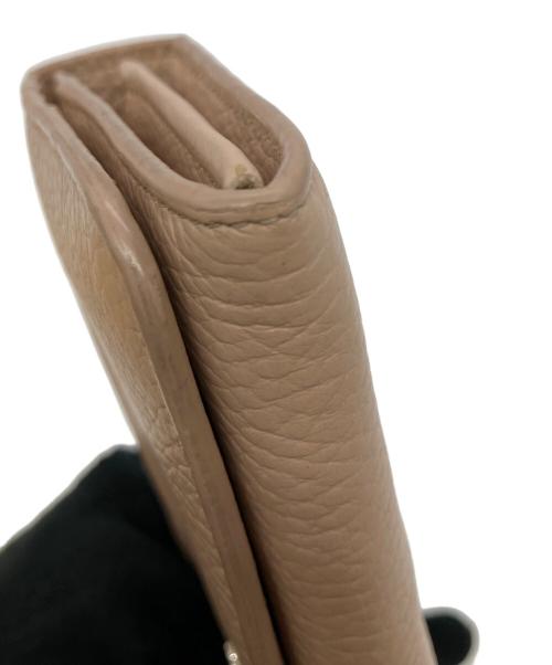 TOD'S（トッズ）TOD'S (トッズ) 長財布 ピンクの古着・服飾アイテム