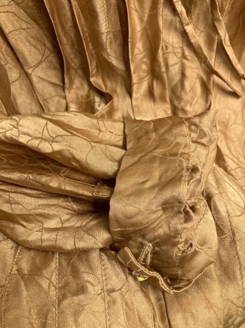 CHANEL（シャネル）CHANEL (シャネル) カメリア フーデッドコート ベージュ サイズ:SIZE 38の古着・服飾アイテム