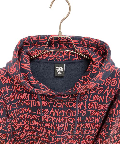 stussy（ステューシー）stussy (ステューシー) ワールドツアーロゴパーカー ネイビー×レッド サイズ:SIZE Sの古着・服飾アイテム