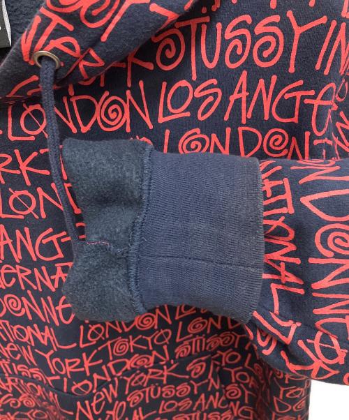 stussy（ステューシー）stussy (ステューシー) ワールドツアーロゴパーカー ネイビー×レッド サイズ:SIZE Sの古着・服飾アイテム