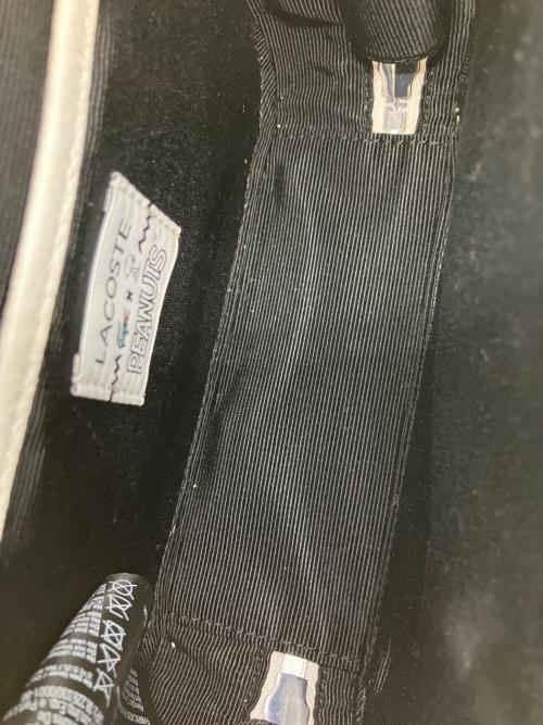 LACOSTE（ラコステ）LACOSTE (ラコステ) PEANUTS (ピーナッツ) プリントレザーショルダーバッグ ホワイトの古着・服飾アイテム