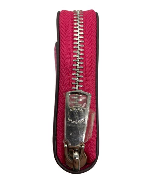 COACH（コーチ）COACH (コーチ) PEANUTS (ピーナッツ) ラウンドファスナーウォレット ピンクの古着・服飾アイテム