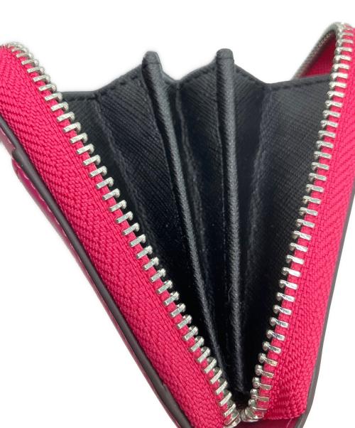 COACH（コーチ）COACH (コーチ) PEANUTS (ピーナッツ) ラウンドファスナーウォレット ピンクの古着・服飾アイテム