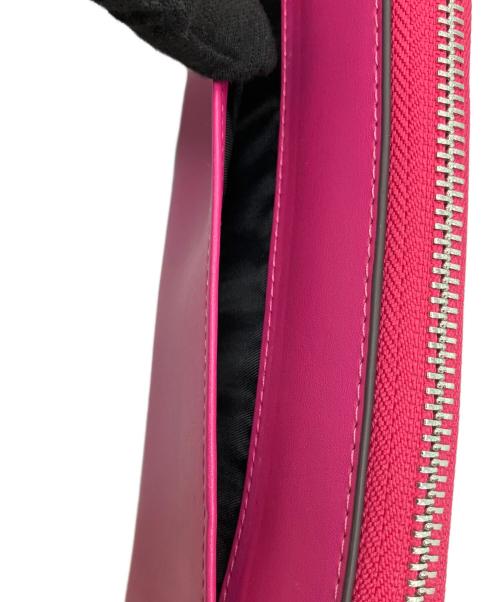 COACH（コーチ）COACH (コーチ) PEANUTS (ピーナッツ) ラウンドファスナーウォレット ピンクの古着・服飾アイテム