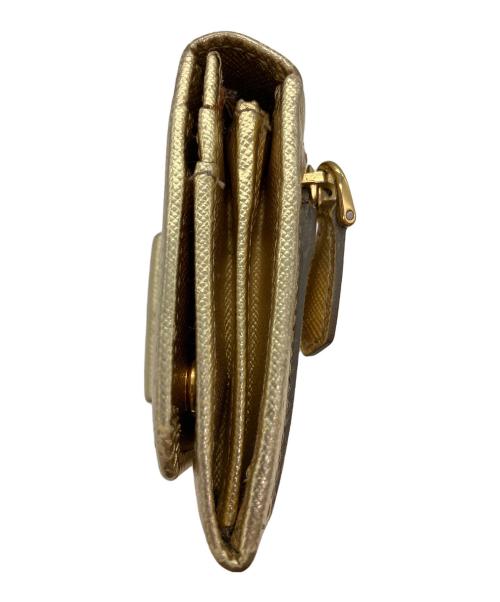 PRADA（プラダ）PRADA (プラダ) サフィアーノレザー リボン付き長財布 ゴールドの古着・服飾アイテム