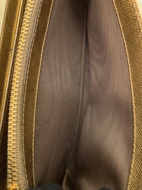 PRADA（プラダ）PRADA (プラダ) サフィアーノレザー リボン付き長財布 ゴールドの古着・服飾アイテム