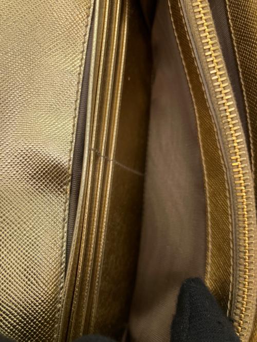 PRADA（プラダ）PRADA (プラダ) サフィアーノレザー リボン付き長財布 ゴールドの古着・服飾アイテム