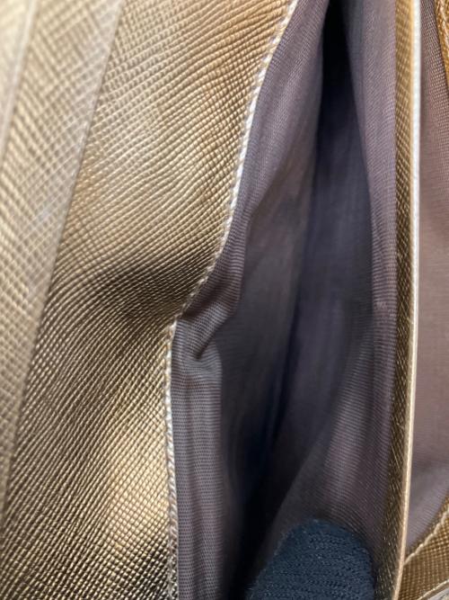 PRADA（プラダ）PRADA (プラダ) サフィアーノレザー リボン付き長財布 ゴールドの古着・服飾アイテム