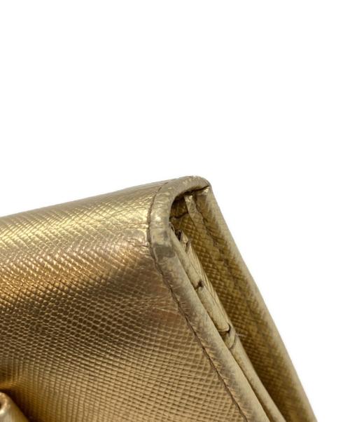 PRADA（プラダ）PRADA (プラダ) サフィアーノレザー リボン付き長財布 ゴールドの古着・服飾アイテム