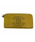 CHANEL（シャネル）の古着「ラウンドファスナー長財布」｜イエロー