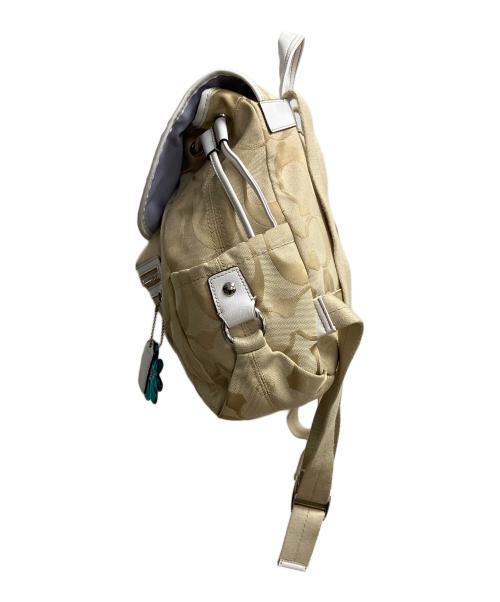 COACH（コーチ）COACH (コーチ) コーチ シグネチャー デイジー リュック ベージュの古着・服飾アイテム