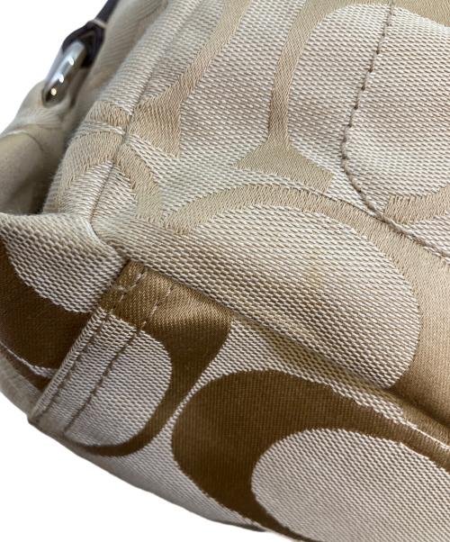 COACH（コーチ）COACH (コーチ) コーチ シグネチャー デイジー リュック ベージュの古着・服飾アイテム