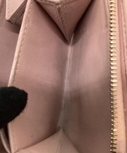 MIU MIU（ミュウミュウ）MIU MIU (ミュウミュウ) マテラッセ　2つ折り財布 ピンクの古着・服飾アイテム