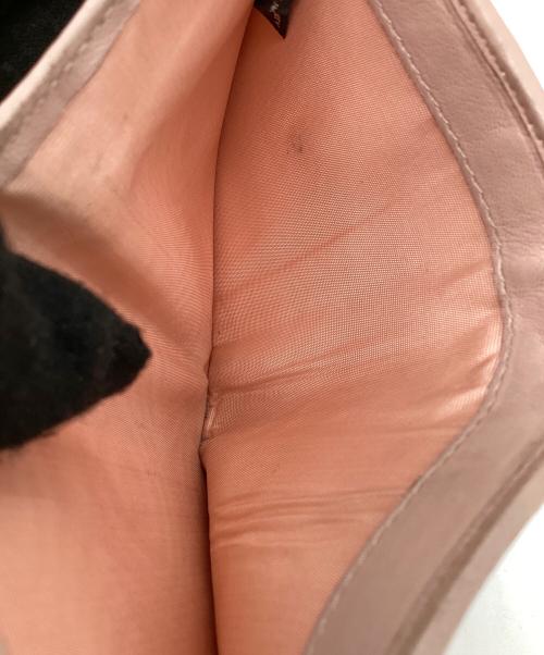 MIU MIU（ミュウミュウ）MIU MIU (ミュウミュウ) マテラッセ　2つ折り財布 ピンクの古着・服飾アイテム