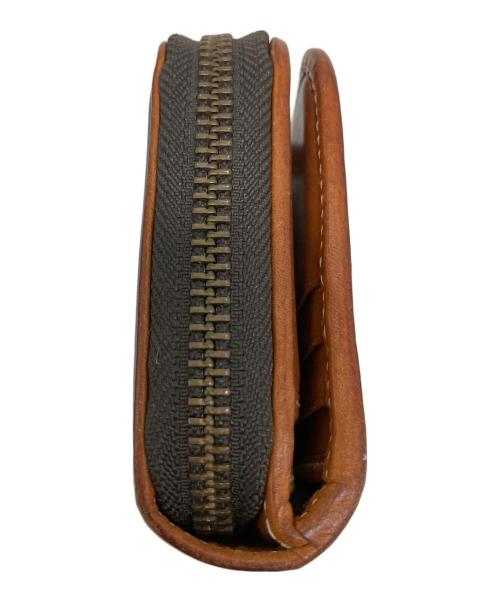 HUNTING WORLD（ハンティングワールド）HUNTING WORLD (ハンティングワールド) バチューサーパス モンタナ 2つ折り財布 ブラック×ブラウンの古着・服飾アイテム