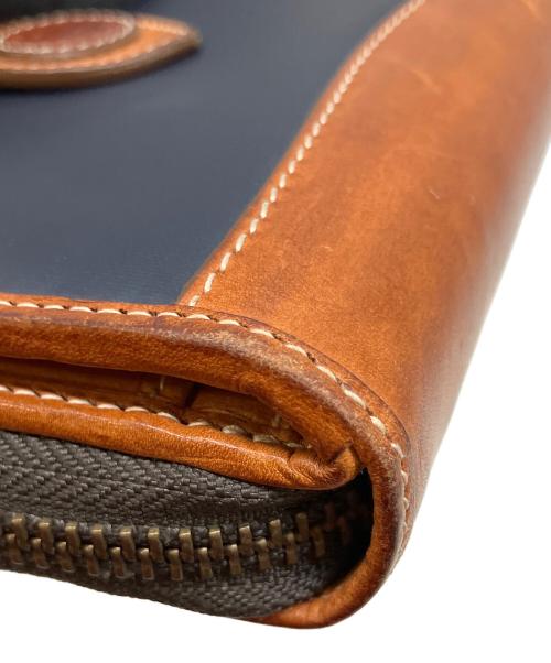 HUNTING WORLD（ハンティングワールド）HUNTING WORLD (ハンティングワールド) バチューサーパス モンタナ 2つ折り財布 ブラック×ブラウンの古着・服飾アイテム