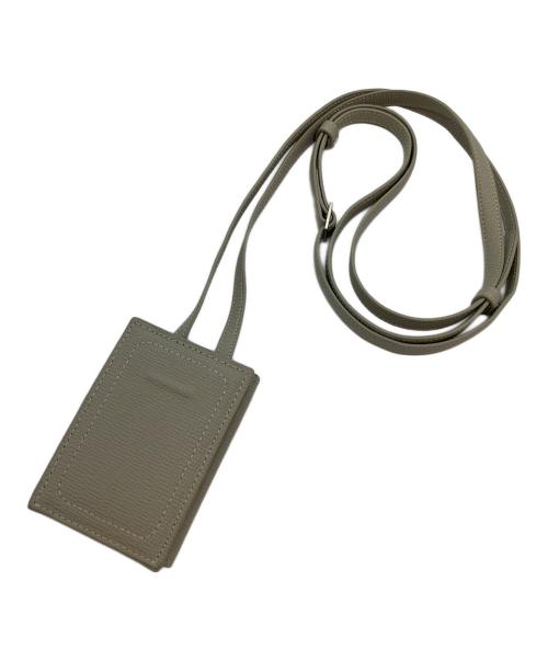 objects.io（オブジェクトアイオー）objects.io (オブジェクトアイオー) レザーストラップ付iPhoneアクセサリー カードケース カーキの古着・服飾アイテム