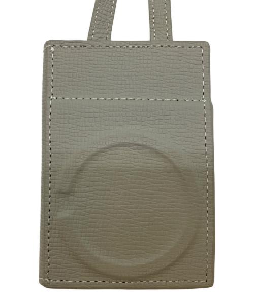 objects.io（オブジェクトアイオー）objects.io (オブジェクトアイオー) レザーストラップ付iPhoneアクセサリー カードケース カーキの古着・服飾アイテム