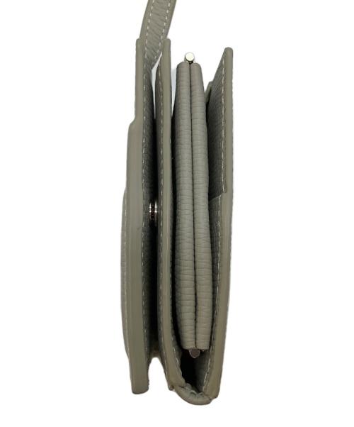 objects.io（オブジェクトアイオー）objects.io (オブジェクトアイオー) レザーストラップ付iPhoneアクセサリー カードケース カーキの古着・服飾アイテム