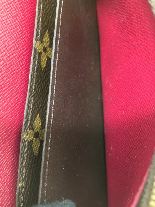 LOUIS VUITTON（ルイ ヴィトン）LOUIS VUITTON (ルイ ヴィトン) モノグラム ポルトフォイユ・エミリー 長財布 ブラウンの古着・服飾アイテム