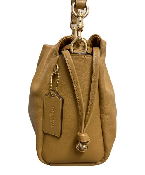 COACH（コーチ）COACH (コーチ) フェイ ドローストリング バッグ 2WAYバッグ ベージュの古着・服飾アイテム