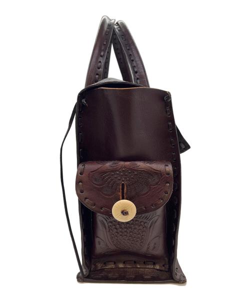 Carving Tribes（カービングトライブス）Carving Tribes (カービングトライブス) ハンドバッグ ブラウンの古着・服飾アイテム