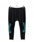 CRONOS（クロノス）の古着「BLACKLETTER SKINNY PANTS スウェットパンツ」｜ブラック