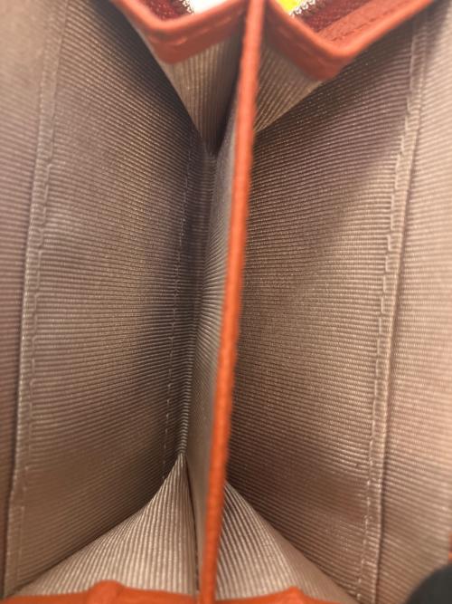 GIANNI CHIARINI（ジャンニ キアリーニ）GIANNI CHIARINI (ジャンニ キアリーニ) 3つ折り財布 オレンジの古着・服飾アイテム