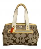 COACHコーチ）の古着「シグネチャー　トートバッグ」｜ベージュ×ホワイト
