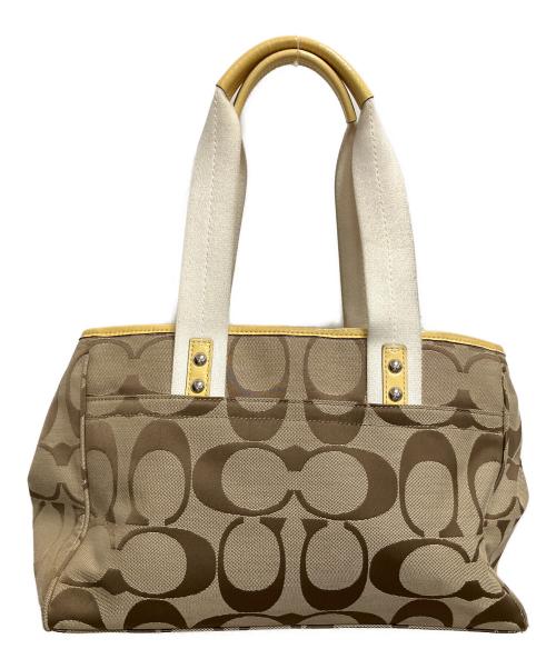 COACH（コーチ）COACH (コーチ) シグネチャー　トートバッグ ベージュ×ホワイトの古着・服飾アイテム