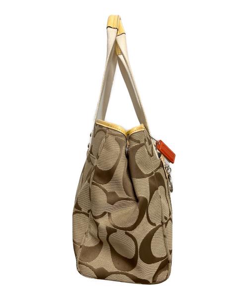 COACH（コーチ）COACH (コーチ) シグネチャー　トートバッグ ベージュ×ホワイトの古着・服飾アイテム