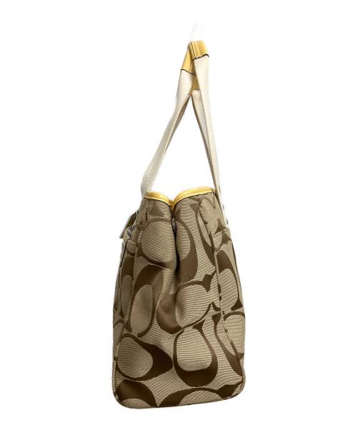 COACH（コーチ）COACH (コーチ) シグネチャー　トートバッグ ベージュ×ホワイトの古着・服飾アイテム