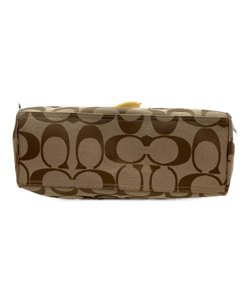 COACH（コーチ）COACH (コーチ) シグネチャー　トートバッグ ベージュ×ホワイトの古着・服飾アイテム