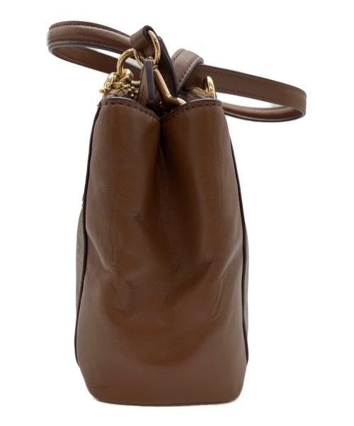 COACH（コーチ）COACH (コーチ) シグネチャー ミニ クリスティー キャリーオール ブラウンの古着・服飾アイテム