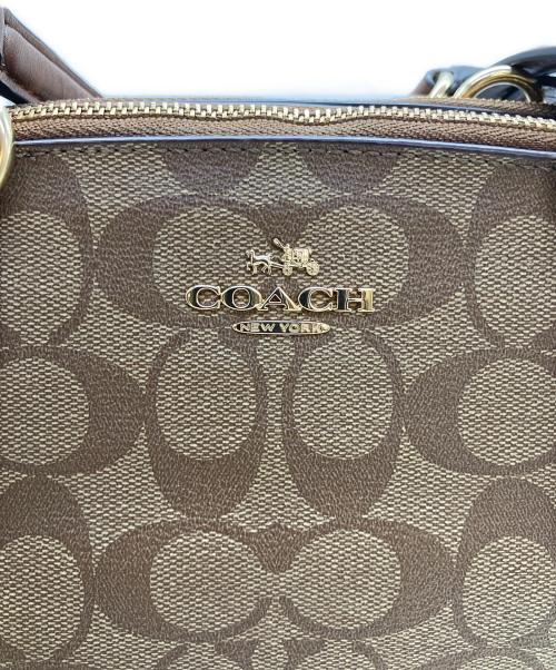 COACH（コーチ）COACH (コーチ) シグネチャー ミニ クリスティー キャリーオール ブラウンの古着・服飾アイテム