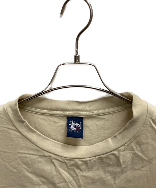stussy（ステューシー）stussy (ステューシー) ワールドツアーT 半袖Tシャツ ベージュ サイズ:SIZE Lの古着・服飾アイテム
